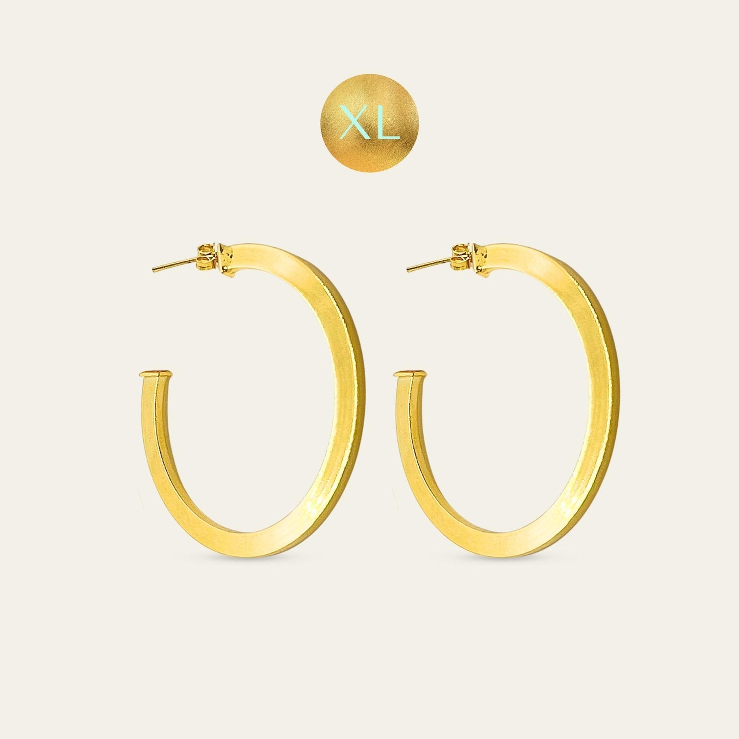 Argollas rectangulares enchapadas en oro de 18 kt, sobre fondo blanco talla XL - Coca Johnson Joyas - Chile