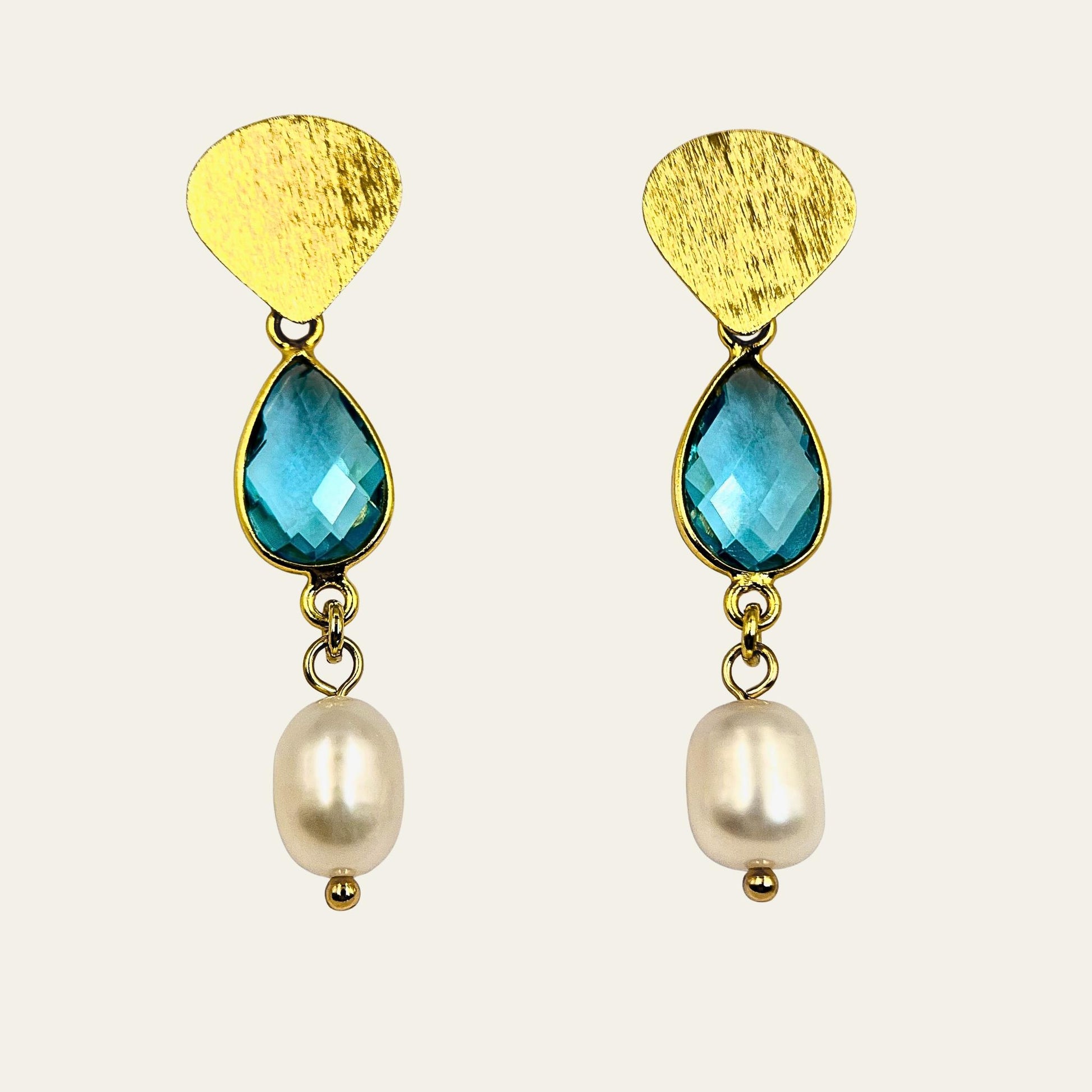 Aros largos con gota de topacio azul y perla de rio