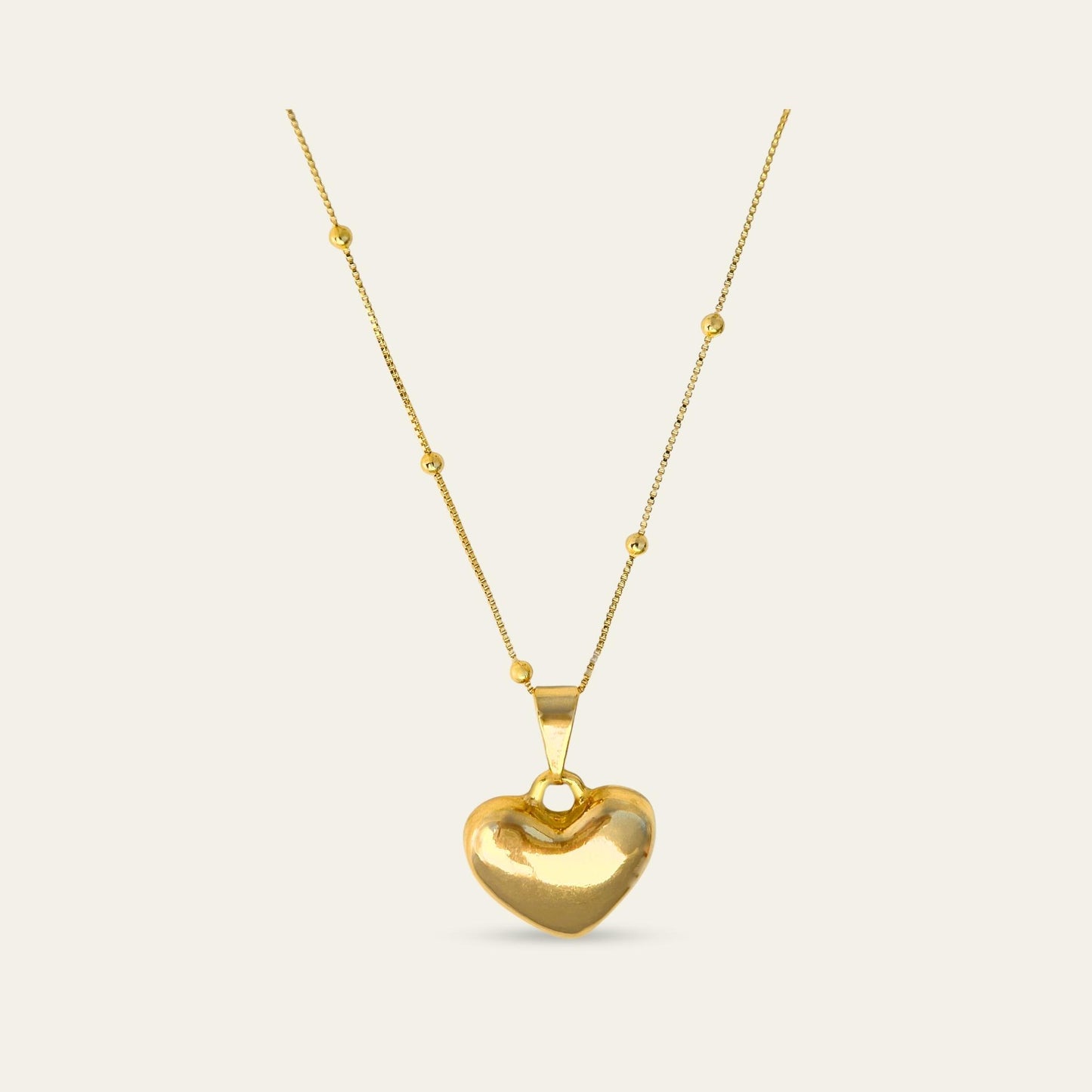 Collar_cadena con bolitas enchapada en oro 18 Kt, colagante de corazón enchapado en oro de 18kt - Coca Johnson Joyas - Chile