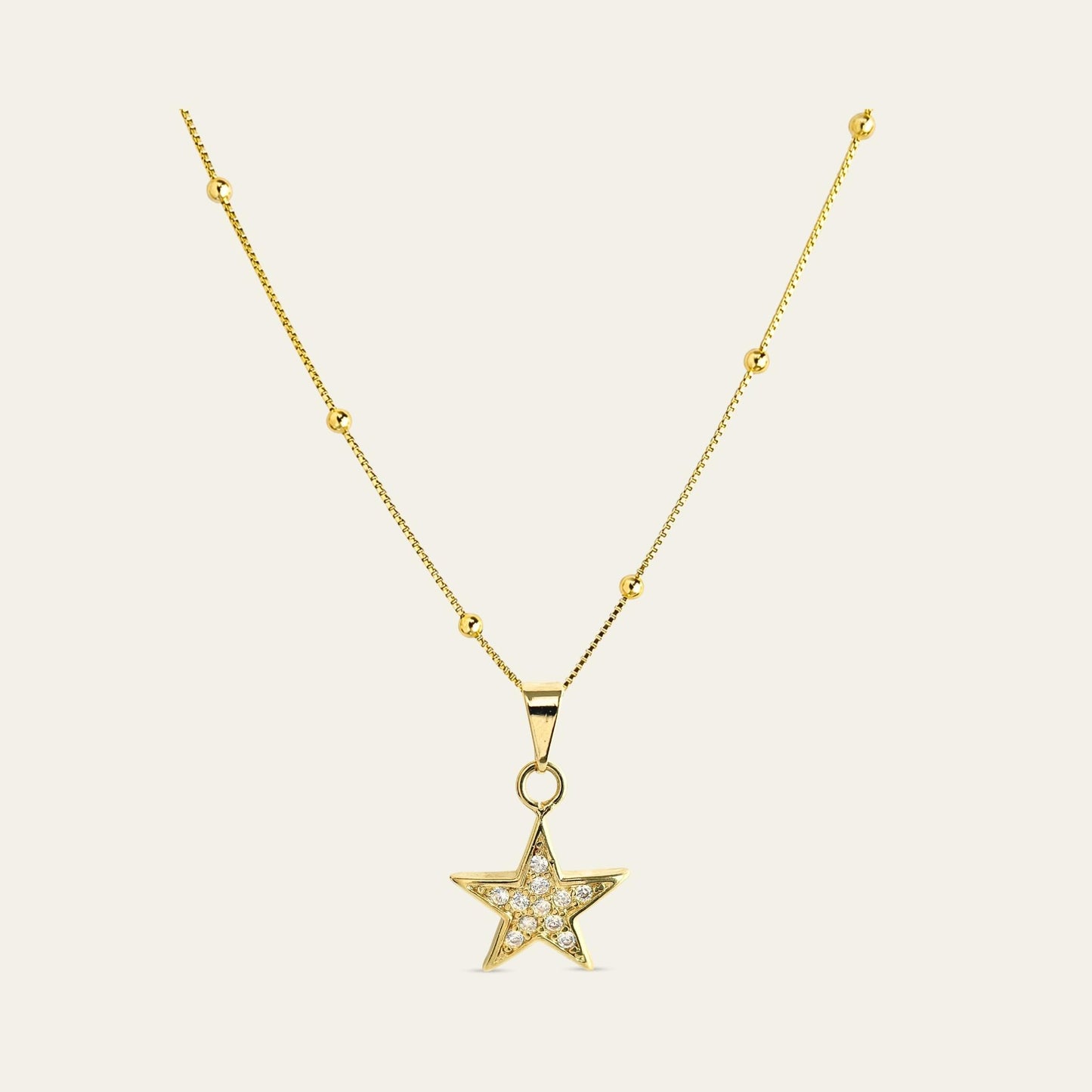 Collar_cadena con bolitas enchapada en oro 18 Kt, colagante de estrella con circones - Coca Johnson Joyas - Chile