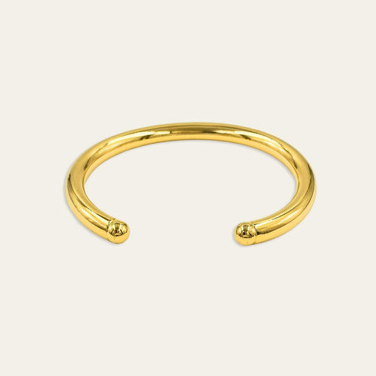 Esclava gruesa enchapada en oro de 18kt, sobre fondo blanco  - Coca Johnson Joyas - Chile