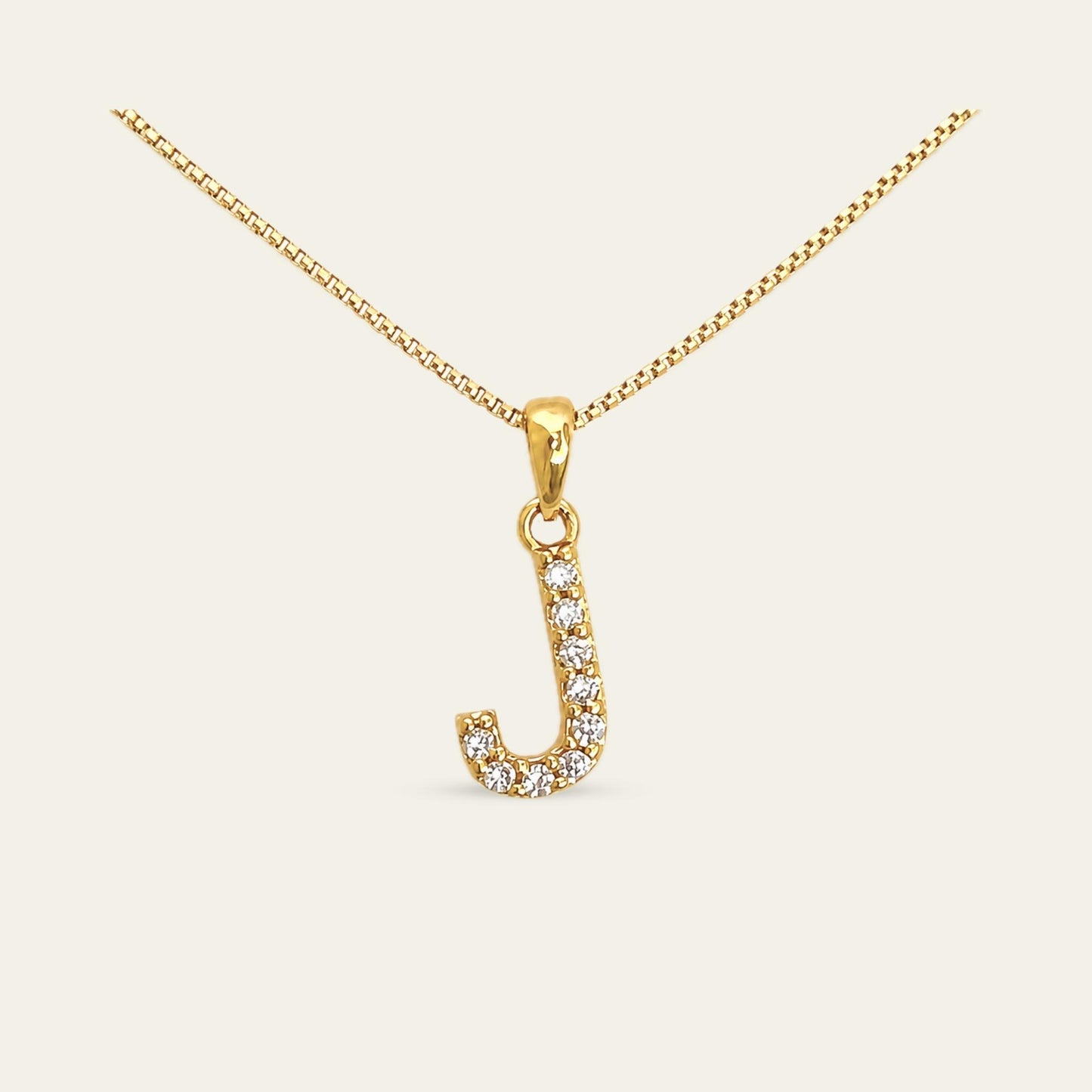 Colgante de letra inicial J enchapado en oro con circones 