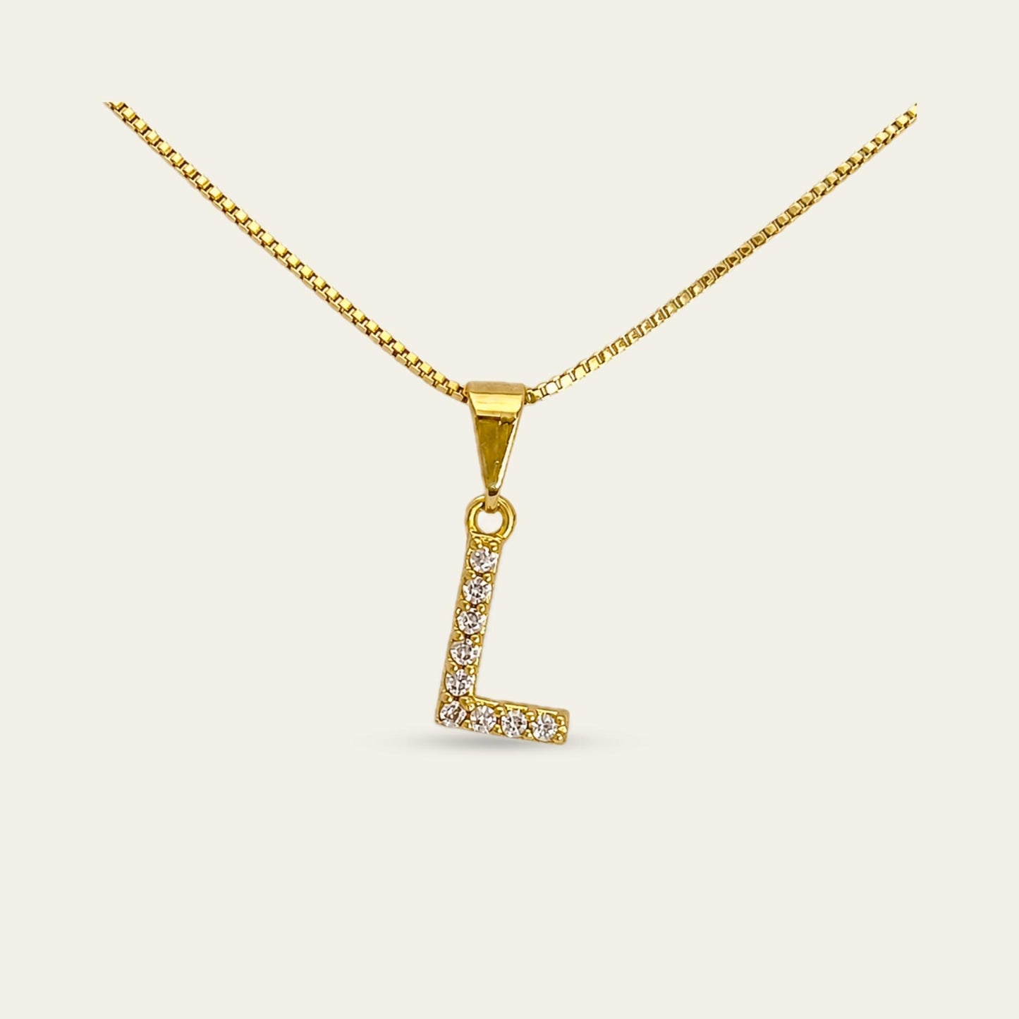 Colgante de letra inicial L enchapado en oro con circones 