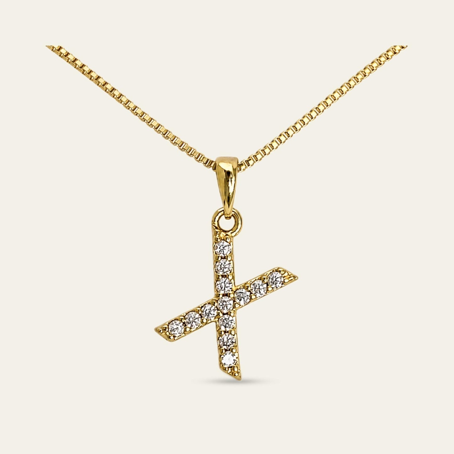 Colgante de letra inicial X enchapado en oro con circones 